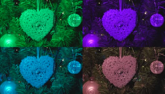 圣诞树装饰。近距离观察银色闪烁的心脏。圣诞节的时候高清在线视频素材下载