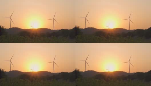 在印度古吉拉特邦的万卡纳，夕阳下的风车剪影。绿色能源的背景。夕阳下风电场的剪影。清洁能源的背景高清在线视频素材下载
