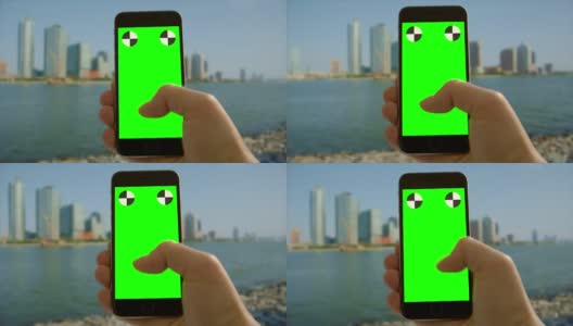 城市智能手机上网发短信人手绿屏色差高清在线视频素材下载