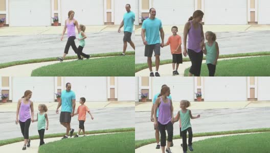 一家人带着两个孩子散步高清在线视频素材下载