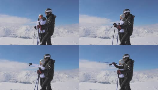 滑雪者们在山谷中看到了一些有趣的东西，并向彼此展示高清在线视频素材下载