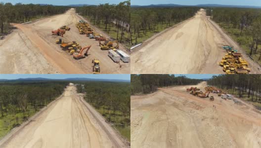 航拍:近距离飞行在碎石路面和施工机械上方高清在线视频素材下载