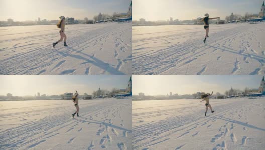一个穿着比基尼的长发女人在雪地上跳跃。高清在线视频素材下载