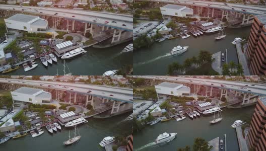 4K航拍日落时，河游艇俱乐部的船只高清在线视频素材下载