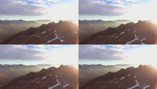 日落时高山景观的鸟瞰图高清在线视频素材下载