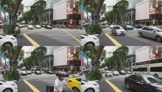 阳光明媚的一天新加坡城著名购物区交通街道十字路口全景4k高清在线视频素材下载