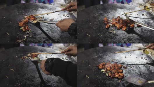 在一个大煎锅上和洋葱一起炸的小块鸡肉，用来做烤肉卷高清在线视频素材下载