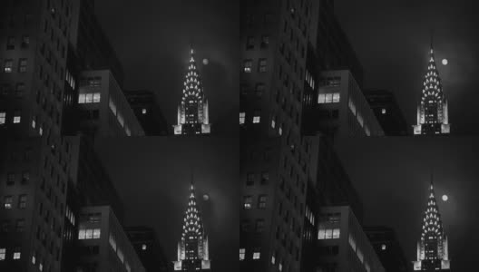 纽约克莱斯勒大厦上空的满月高清在线视频素材下载