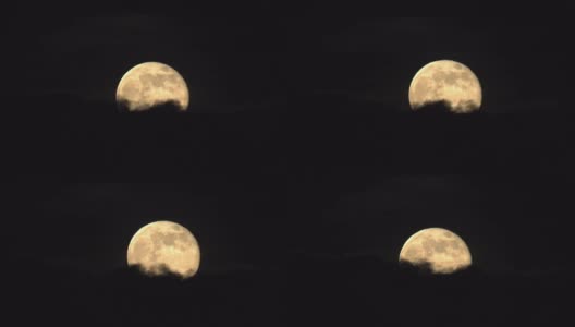 一轮超级满月从乌云中升起高清在线视频素材下载