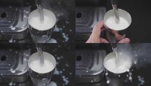 咖啡师用慢动作蒸牛奶。蒸汽棒加热牛奶。错误溅起牛奶。工作失败洒了牛奶。高清在线视频素材下载