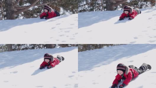 小男孩在冬天的户外雪地上滑雪高清在线视频素材下载