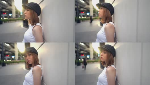4K年轻亚洲女子肖像走在城市街道高清在线视频素材下载