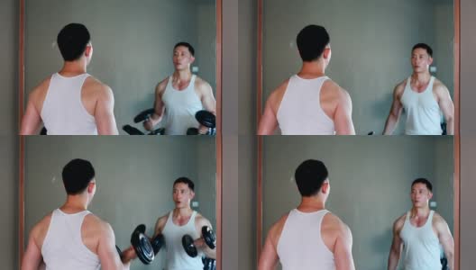 英俊健美的亚洲运动男子在健身房做哑铃卷曲练习。-股票视频高清在线视频素材下载