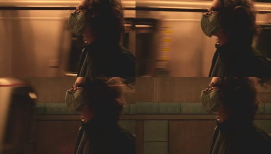 一名戴着呼吸面罩的男子在行驶的地铁列车经过时高清在线视频素材下载
