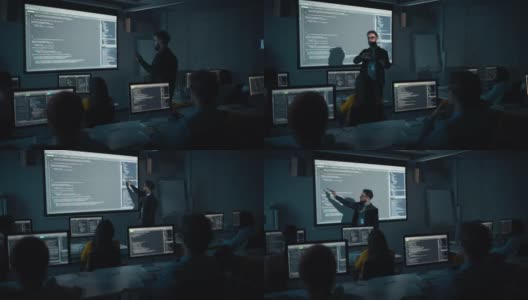 教师在黑暗的大学教室里给多元的多民族男女学生讲授计算机科学。放映幻灯片与编程代码。解释信息技术。高清在线视频素材下载