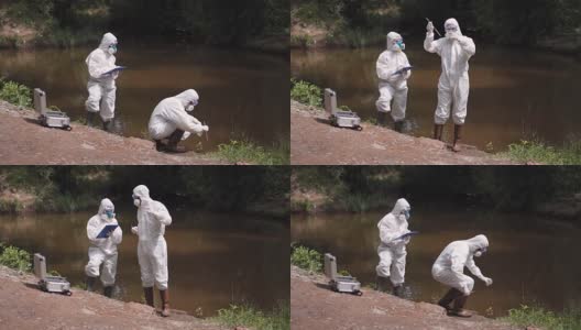 两名科学家从河流中提取水样高清在线视频素材下载
