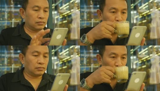 成熟的男人在咖啡店用手机高清在线视频素材下载