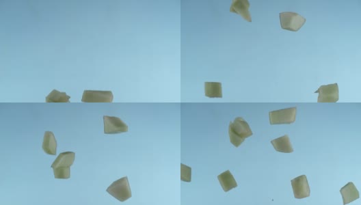 甜瓜片在慢镜头中飞舞高清在线视频素材下载
