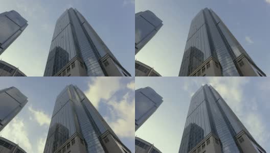 现代摩天大楼映照着美丽的蓝天高清在线视频素材下载