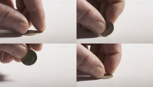 手拿15 kopek苏联苏联硬币从书桌。高清在线视频素材下载