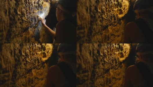 人们在探索一个古老的洞穴高清在线视频素材下载