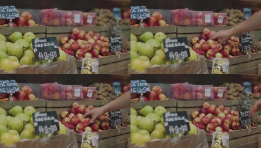 一堆红绿相间的有机苹果。超市里漂亮的成熟苹果。健康天然的食品。纯素主义和素食主义概念高清在线视频素材下载