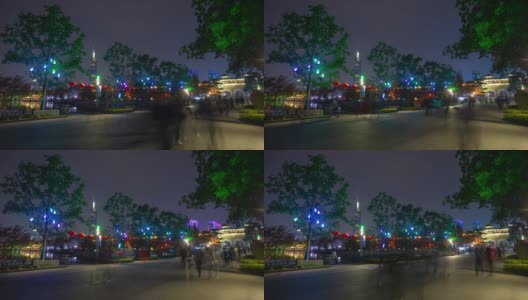 夜晚的时间照亮了南京城墙著名的湖滨公园广场，延时全景4k中国高清在线视频素材下载