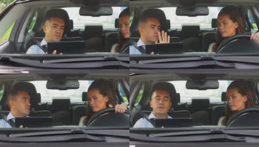 女人和驾校教练在车里聊天高清在线视频素材下载