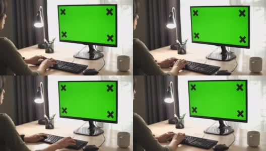 亚洲妇女在家中使用电脑绿屏高清在线视频素材下载