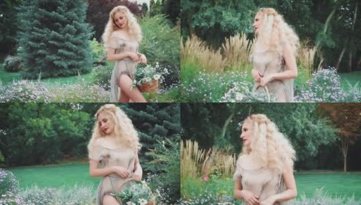 一个成年人，迷人的金发女人走在花园里，穿着灰色的裙子高清在线视频素材下载