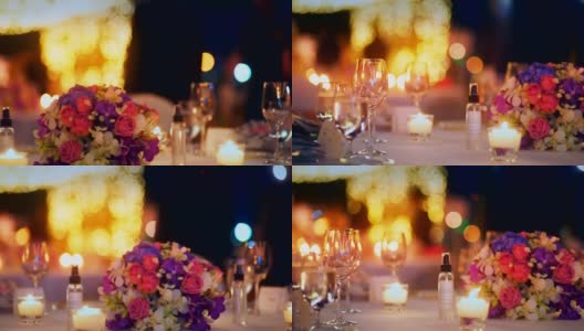 浪漫的户外婚礼餐桌，插花和蜡烛。高清在线视频素材下载