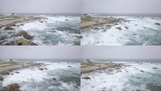 岩石海岸线附近的高尔夫球场的航拍图高清在线视频素材下载