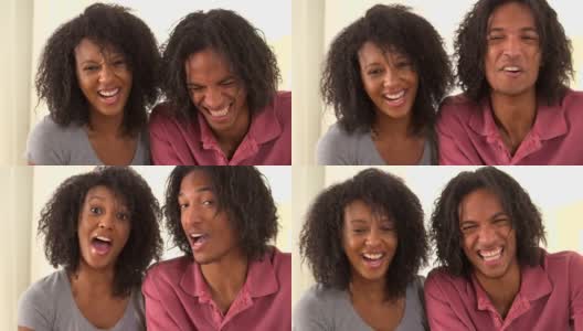 一对对着镜头笑的黑人夫妇高清在线视频素材下载