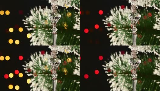 不寻常的装饰-水晶玩具挂在圣诞树上，散焦，轻，黑色，花环高清在线视频素材下载