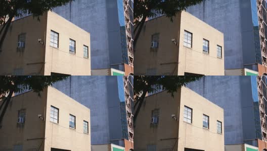 建立白天拍摄的空置的止赎建筑在市中心地区高清在线视频素材下载