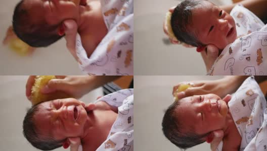 新生儿在浴缸中高清在线视频素材下载