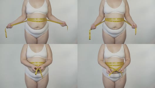 肥胖妇女测量她的腰围在白色内衣，动机和节食高清在线视频素材下载