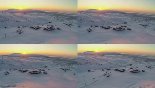 在日落时飞过北部的滑雪场高清在线视频素材下载