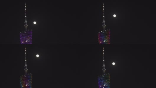 广州塔和冉冉升起的月亮延时高清在线视频素材下载