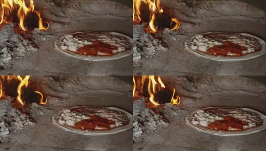 在柴火烤箱里烤披萨高清在线视频素材下载