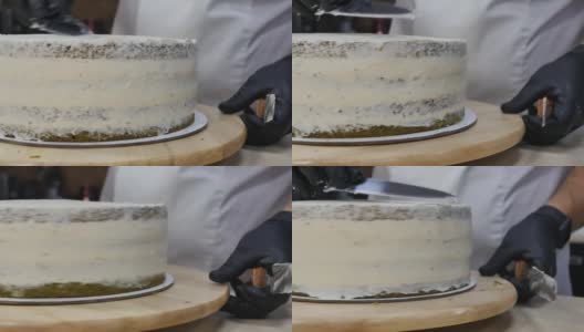 糕点师制作菠菜奶油海绵蛋糕的过程高清在线视频素材下载