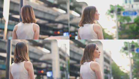4K年轻亚洲女子肖像走在城市街道高清在线视频素材下载