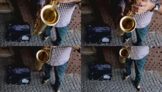 街头演奏萨克斯风的音乐家高清在线视频素材下载