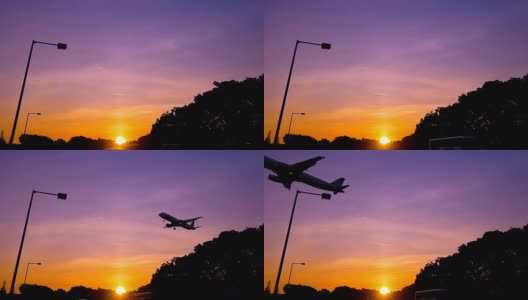 飞机降落在紫色的天空在日落，特写，慢镜头高清在线视频素材下载