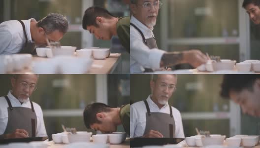 3位专业的亚洲华人高级男子咖啡师、鉴定人、品酒师表演杯咖啡，与同事品尝杯咖啡后在剪贴板上写下高清在线视频素材下载