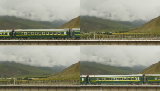 4k列车行驶在青藏铁路上，中国青藏高原风光旖旎。高清在线视频素材下载