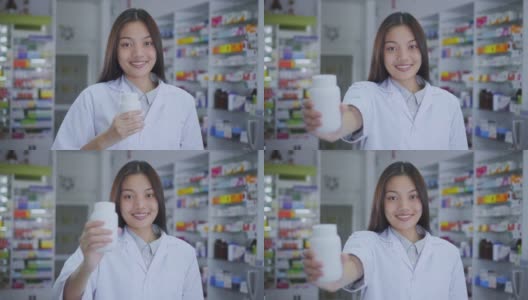 药剂师展示一个药瓶，慢镜头高清在线视频素材下载