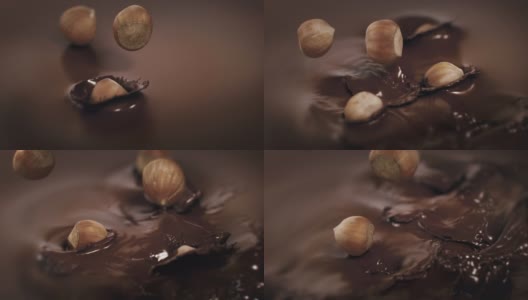 4K超级慢动作，榛子溅入液态黑巧克力高清在线视频素材下载