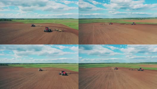 用两台农业机械播种的田地高清在线视频素材下载