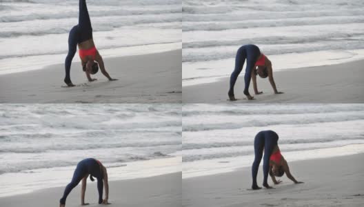一个亚洲女人正在沙滩上练习瑜伽姿势。经验丰富的女性瑜伽慢动作。健康的生活方式高清在线视频素材下载